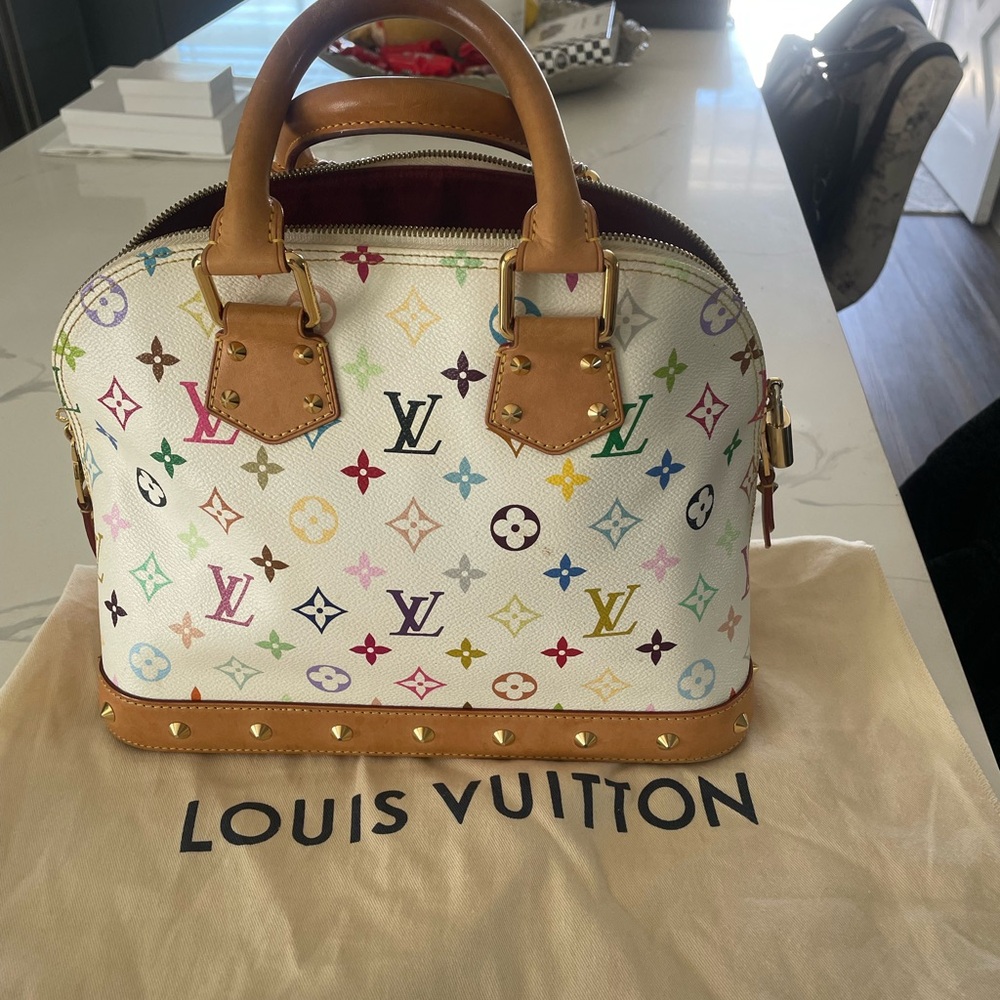 LOUIS VUITTON
Monogram Multicolor Alma White like Brand New